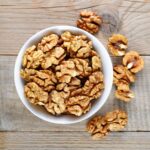 Walnuts in bowl top view